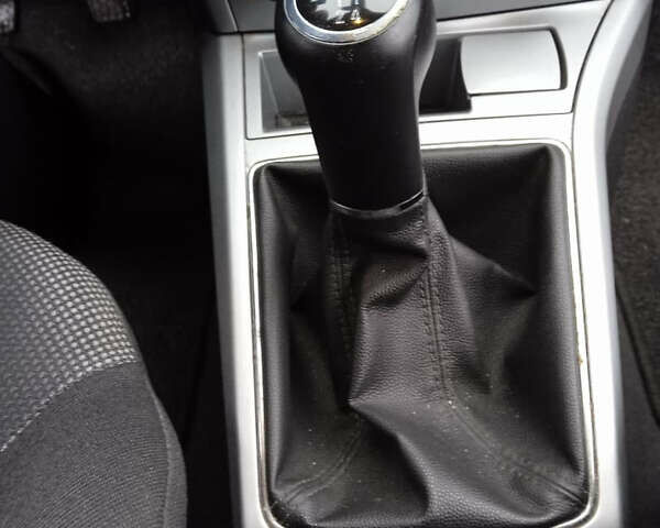 Серый Опель Астра, объемом двигателя 1.6 л и пробегом 175 тыс. км за 5800 $, фото 9 на Automoto.ua