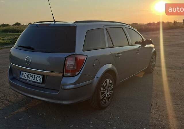 Серый Опель Астра, объемом двигателя 1.6 л и пробегом 208 тыс. км за 5900 $, фото 1 на Automoto.ua