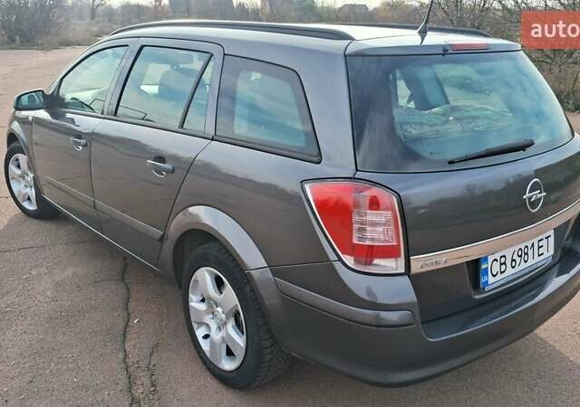 Серый Опель Астра, объемом двигателя 1.6 л и пробегом 232 тыс. км за 5899 $, фото 2 на Automoto.ua