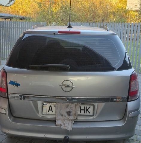 Серый Опель Астра, объемом двигателя 1 л и пробегом 303 тыс. км за 5500 $, фото 5 на Automoto.ua
