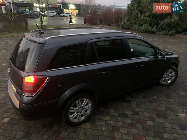 Серый Опель Астра, объемом двигателя 1.69 л и пробегом 294 тыс. км за 5000 $, фото 26 на Automoto.ua