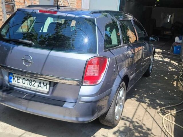 Серый Опель Астра, объемом двигателя 1.6 л и пробегом 237 тыс. км за 5300 $, фото 2 на Automoto.ua