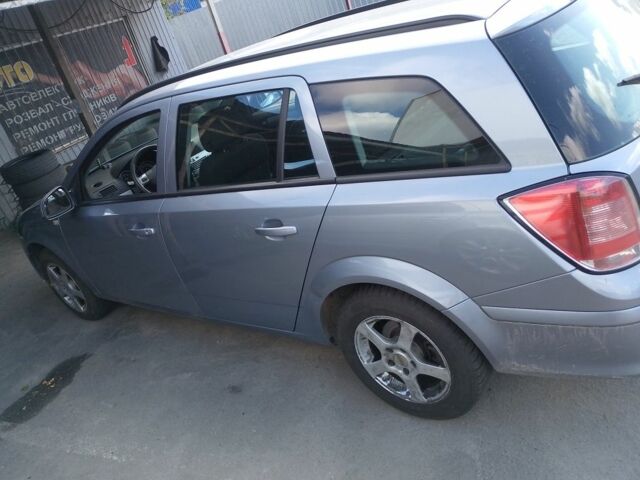 Серый Опель Астра, объемом двигателя 1.6 л и пробегом 255 тыс. км за 5800 $, фото 3 на Automoto.ua