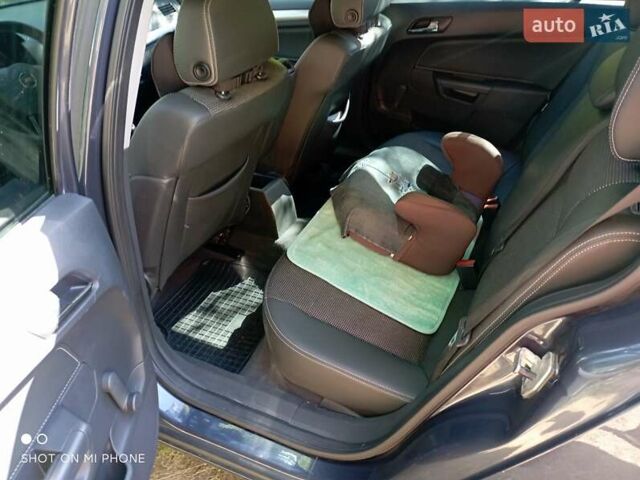 Серый Опель Астра, объемом двигателя 1.6 л и пробегом 221 тыс. км за 5300 $, фото 10 на Automoto.ua