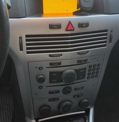 Серый Опель Астра, объемом двигателя 1 л и пробегом 303 тыс. км за 5500 $, фото 7 на Automoto.ua