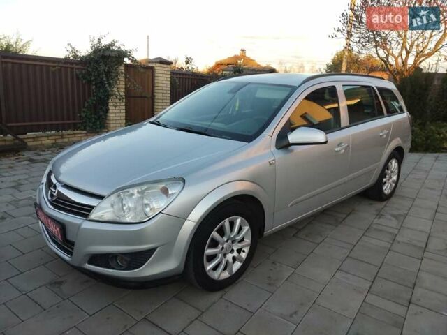 Серый Опель Астра, объемом двигателя 1.6 л и пробегом 240 тыс. км за 5550 $, фото 3 на Automoto.ua