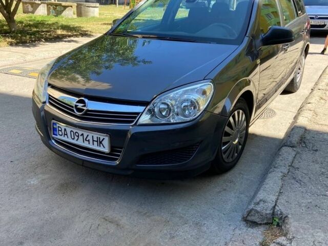 Серый Опель Астра, объемом двигателя 1.4 л и пробегом 213 тыс. км за 5800 $, фото 5 на Automoto.ua