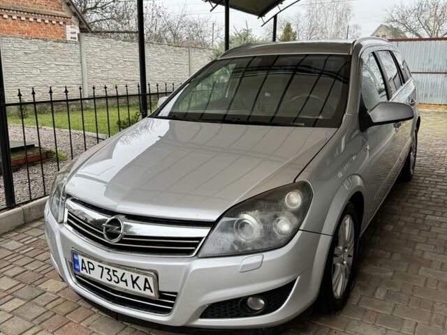 Серый Опель Астра, объемом двигателя 1.9 л и пробегом 220 тыс. км за 6000 $, фото 2 на Automoto.ua