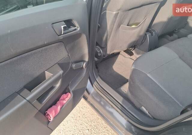 Серый Опель Астра, объемом двигателя 1.6 л и пробегом 232 тыс. км за 5899 $, фото 5 на Automoto.ua