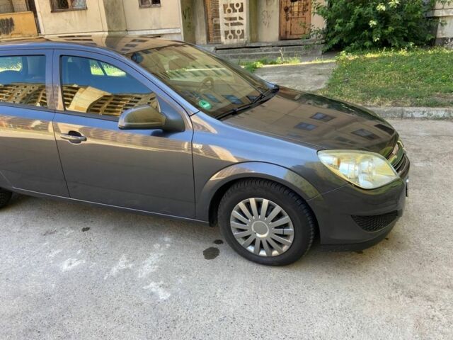 Серый Опель Астра, объемом двигателя 1.4 л и пробегом 213 тыс. км за 5800 $, фото 3 на Automoto.ua