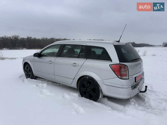 Серый Опель Астра, объемом двигателя 1.9 л и пробегом 200 тыс. км за 5800 $, фото 12 на Automoto.ua