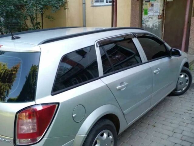 Серый Опель Астра, объемом двигателя 1.7 л и пробегом 267 тыс. км за 5000 $, фото 3 на Automoto.ua