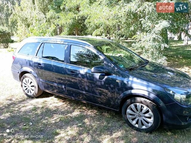 Серый Опель Астра, объемом двигателя 1.6 л и пробегом 221 тыс. км за 5300 $, фото 21 на Automoto.ua