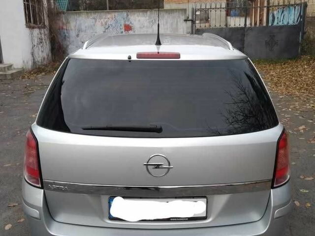 Серый Опель Астра, объемом двигателя 1.6 л и пробегом 250 тыс. км за 6200 $, фото 2 на Automoto.ua