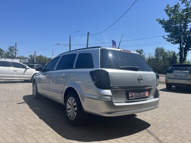 Серый Опель Астра, объемом двигателя 1.7 л и пробегом 254 тыс. км за 5900 $, фото 7 на Automoto.ua