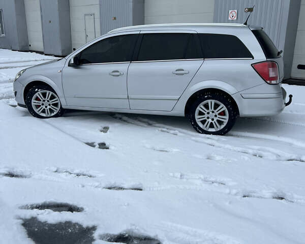 Серый Опель Астра, объемом двигателя 1.69 л и пробегом 314 тыс. км за 5700 $, фото 4 на Automoto.ua