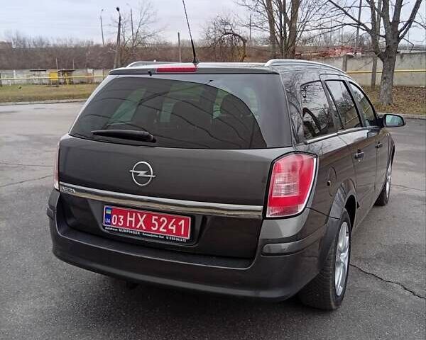 Сірий Опель Астра, об'ємом двигуна 1.6 л та пробігом 188 тис. км за 5799 $, фото 7 на Automoto.ua