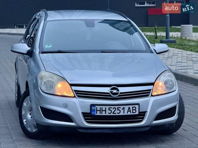 Серый Опель Астра, объемом двигателя 1.69 л и пробегом 252 тыс. км за 4999 $, фото 25 на Automoto.ua