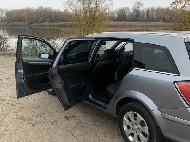 Серый Опель Астра, объемом двигателя 1.9 л и пробегом 297 тыс. км за 5800 $, фото 11 на Automoto.ua