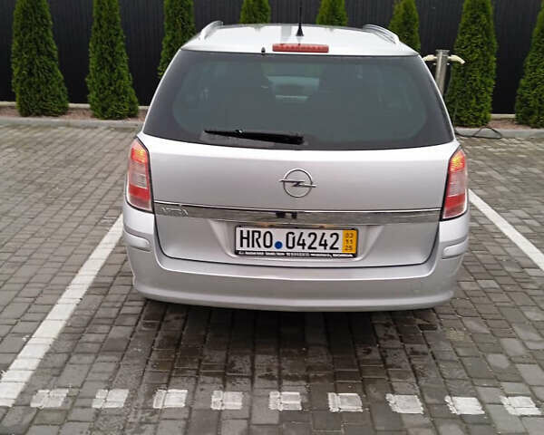 Серый Опель Астра, объемом двигателя 1.6 л и пробегом 175 тыс. км за 5800 $, фото 17 на Automoto.ua