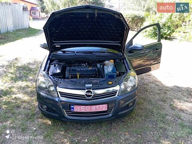 Серый Опель Астра, объемом двигателя 1.6 л и пробегом 221 тыс. км за 5300 $, фото 6 на Automoto.ua