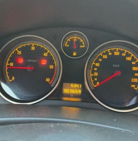 Серый Опель Астра, объемом двигателя 1 л и пробегом 303 тыс. км за 5500 $, фото 6 на Automoto.ua