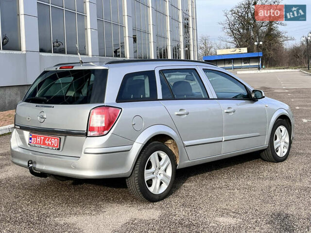 Серый Опель Астра, объемом двигателя 1.6 л и пробегом 230 тыс. км за 5950 $, фото 11 на Automoto.ua