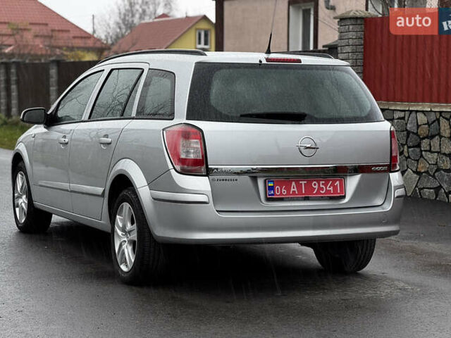 Серый Опель Астра, объемом двигателя 1.4 л и пробегом 199 тыс. км за 5350 $, фото 11 на Automoto.ua