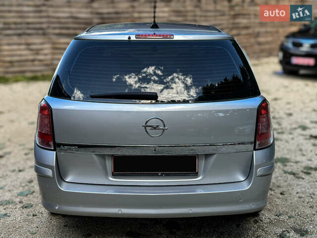Серый Опель Астра, объемом двигателя 1.6 л и пробегом 210 тыс. км за 5500 $, фото 36 на Automoto.ua