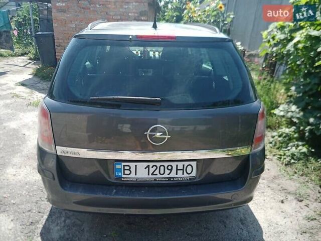 Серый Опель Астра, объемом двигателя 1.6 л и пробегом 210 тыс. км за 5500 $, фото 3 на Automoto.ua
