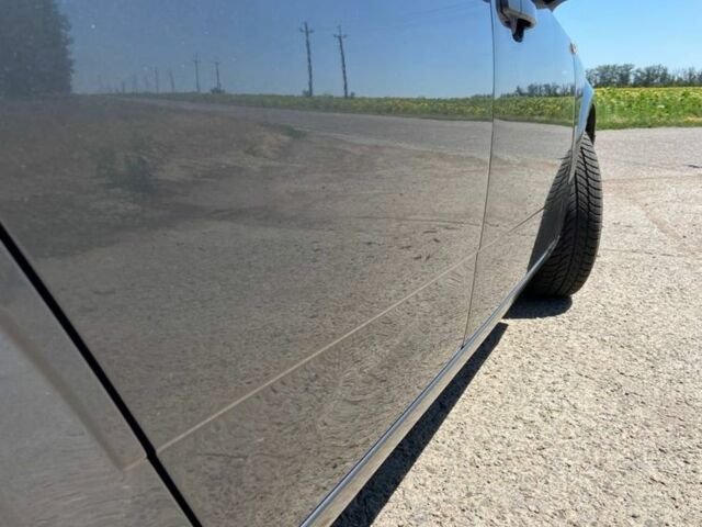 Серый Опель Астра, объемом двигателя 1.4 л и пробегом 213 тыс. км за 5800 $, фото 6 на Automoto.ua