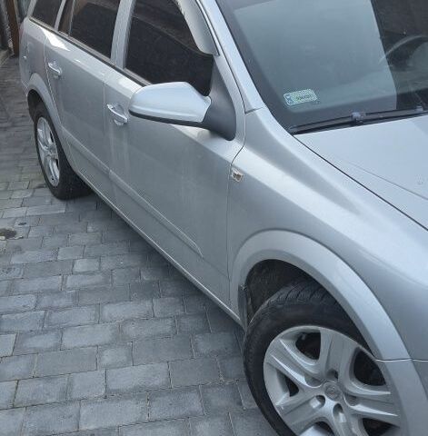 Серый Опель Астра, объемом двигателя 1 л и пробегом 303 тыс. км за 5500 $, фото 2 на Automoto.ua