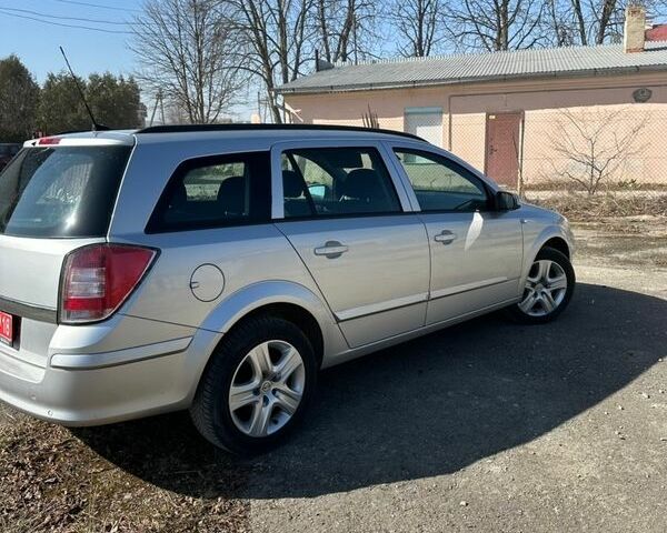 Серый Опель Астра, объемом двигателя 1.6 л и пробегом 226 тыс. км за 5599 $, фото 5 на Automoto.ua