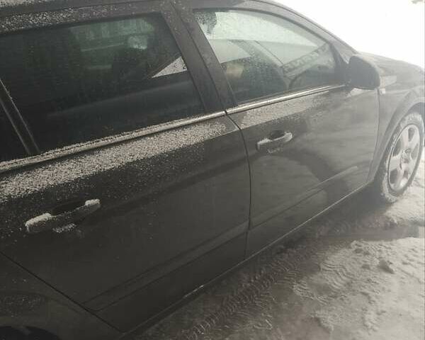 Серый Опель Астра, объемом двигателя 1.69 л и пробегом 267 тыс. км за 5750 $, фото 3 на Automoto.ua