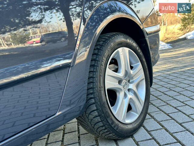 Серый Опель Астра, объемом двигателя 1.6 л и пробегом 212 тыс. км за 5499 $, фото 83 на Automoto.ua