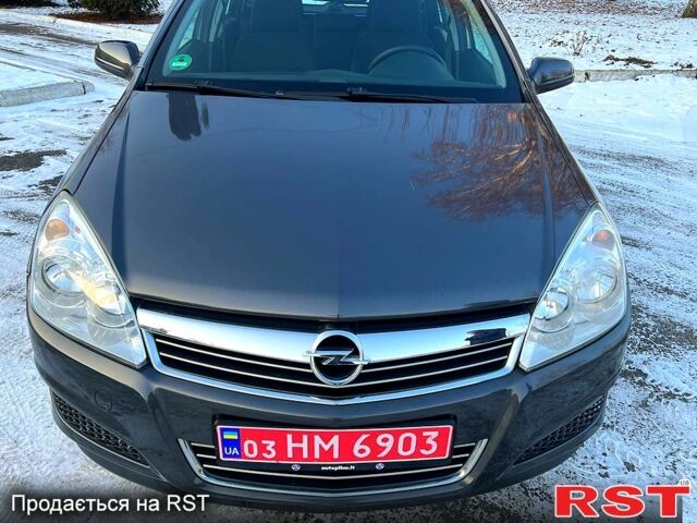 Серый Опель Астра, объемом двигателя 1.6 л и пробегом 20800 тыс. км за 5599 $, фото 5 на Automoto.ua