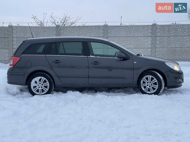 Серый Опель Астра, объемом двигателя 1.6 л и пробегом 198 тыс. км за 6299 $, фото 7 на Automoto.ua