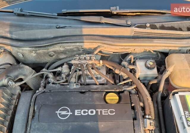 Серый Опель Астра, объемом двигателя 1.6 л и пробегом 208 тыс. км за 5900 $, фото 28 на Automoto.ua