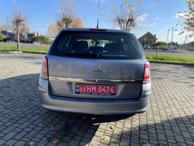 Серый Опель Астра, объемом двигателя 1.6 л и пробегом 228 тыс. км за 5500 $, фото 7 на Automoto.ua