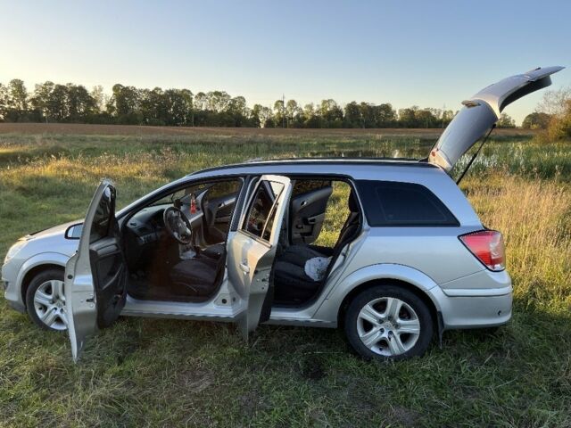 Серый Опель Астра, объемом двигателя 1.6 л и пробегом 243 тыс. км за 4700 $, фото 13 на Automoto.ua