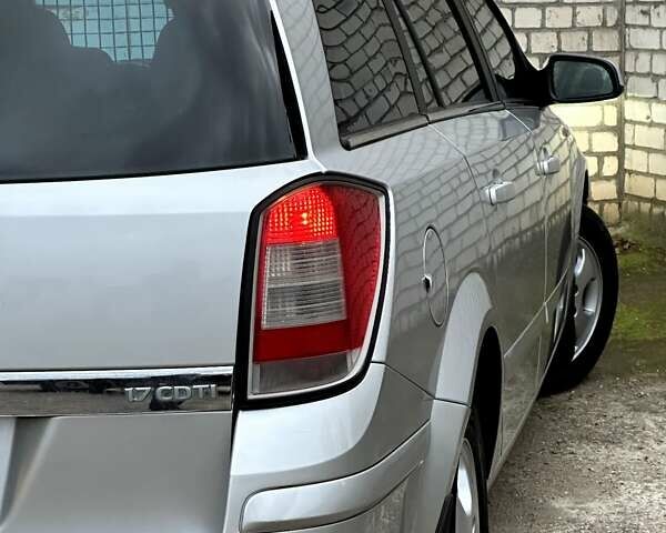 Серый Опель Астра, объемом двигателя 1.7 л и пробегом 304 тыс. км за 5800 $, фото 20 на Automoto.ua