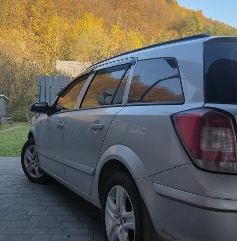 Серый Опель Астра, объемом двигателя 1 л и пробегом 303 тыс. км за 5500 $, фото 4 на Automoto.ua