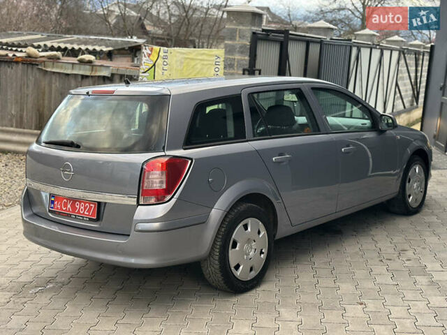 Серый Опель Астра, объемом двигателя 1.6 л и пробегом 224 тыс. км за 5500 $, фото 12 на Automoto.ua