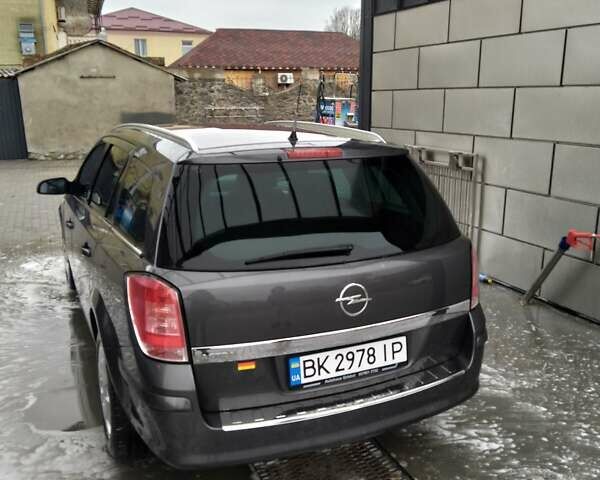Серый Опель Астра, объемом двигателя 1.6 л и пробегом 248 тыс. км за 5800 $, фото 19 на Automoto.ua