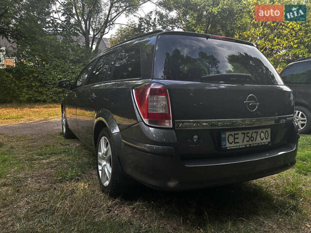 Серый Опель Астра, объемом двигателя 1.9 л и пробегом 235 тыс. км за 6300 $, фото 7 на Automoto.ua