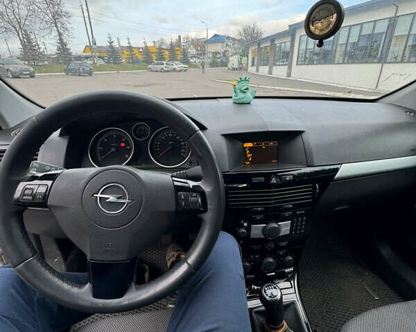 Серый Опель Астра, объемом двигателя 1.69 л и пробегом 320 тыс. км за 5800 $, фото 11 на Automoto.ua