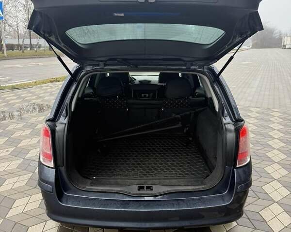 Серый Опель Астра, объемом двигателя 1.6 л и пробегом 175 тыс. км за 5650 $, фото 21 на Automoto.ua