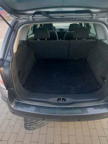 Серый Опель Астра, объемом двигателя 1.6 л и пробегом 173 тыс. км за 6550 $, фото 7 на Automoto.ua