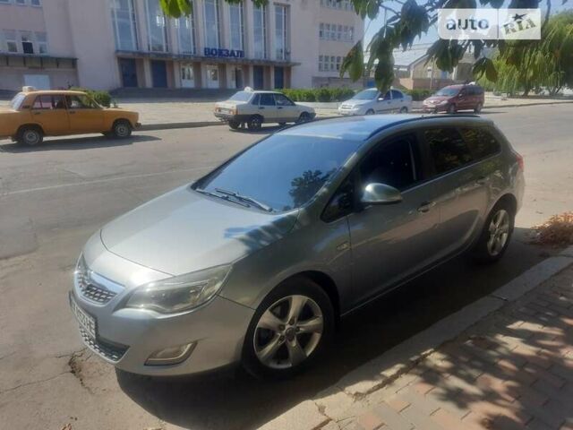 Опель Астра 2010 у Первомайськ на Automoto.ua Сірий Опель Астра, об'ємом двигуна 1.69 л та пробігом 223 тис. км за 7500 $, фото 20 на Automoto.ua