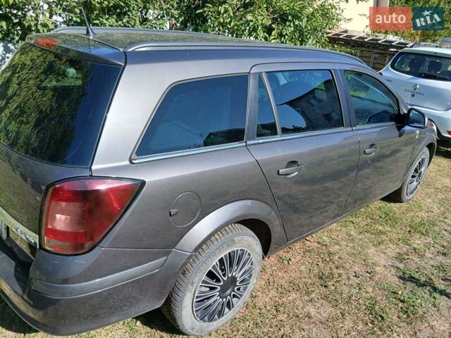 Сірий Опель Астра, об'ємом двигуна 1.7 л та пробігом 233 тис. км за 6700 $, фото 7 на Automoto.ua